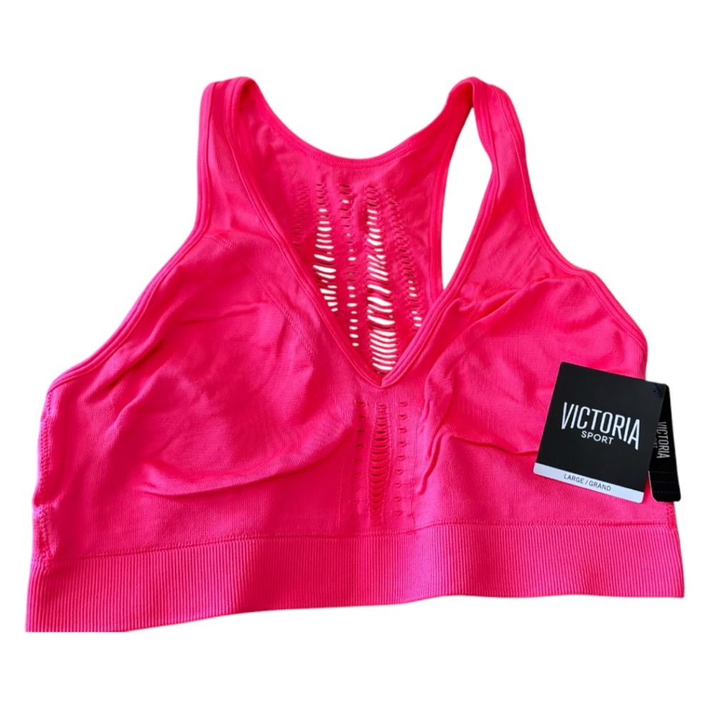 Victoria’s Secret Sports Bra orange color. NWT size: L